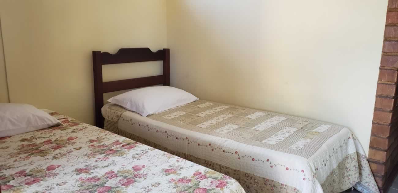 Quarto do apartamento frente mar